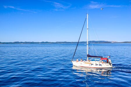 Archipelago Kornati, Dalmatia, Croatia - AUG 18, 2019: Adriatic Sea sailing. Yacht in the sea - sail boat cruise. Yachting, luxury vacation and travel concept.のeditorial素材