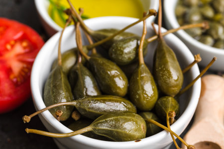 Green pickled Capers. Italian food ingredients.の写真素材