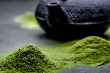 Matcha green tea on black backgroundの写真素材