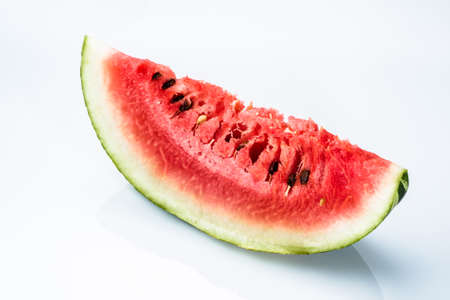 Slices of watermelon isolated on white background, top view. Summer fruit close-up.の写真素材