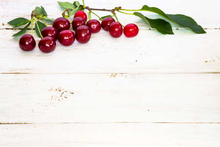 Cherries on wood backgroundの写真素材