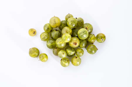 Gooseberries fruits on white background. Ripe summer fruits background.の写真素材