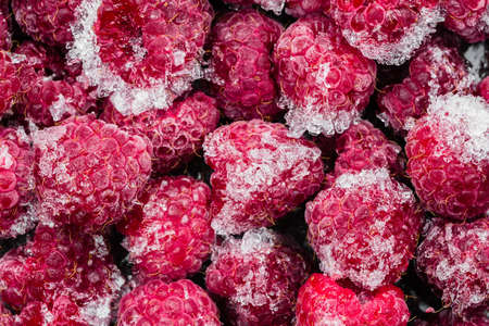 Frozen raspberry, top view. Juicy raspberries, background.の写真素材