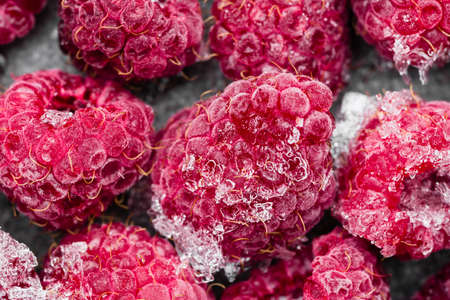 Frozen raspberry, macro. Berries of raspberries, background.の写真素材