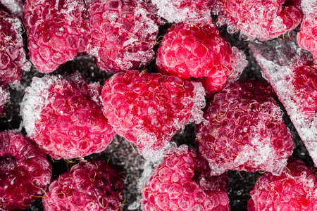 Frozen raspberry, top view. Juicy raspberries, background.の写真素材