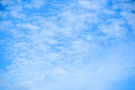 Background of blue sky and cloudsの写真素材