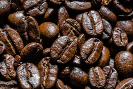Freshly roasted coffee beans backgroundの写真素材