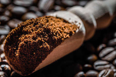 Aromatic powdered coffee beans in scoop.の写真素材