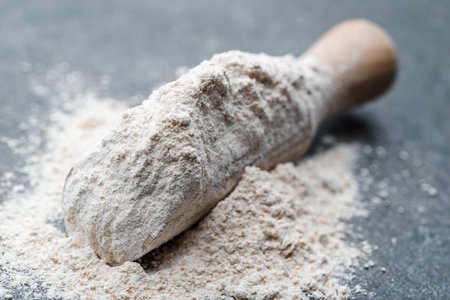 Baking background with flour on dark tableの写真素材