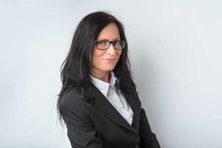 Elegant businesswoman on a white background.の写真素材