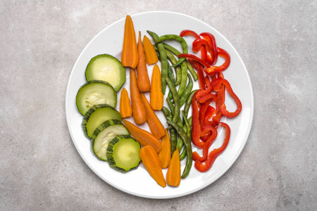 Plate of stir fry vegetables, top viewの写真素材
