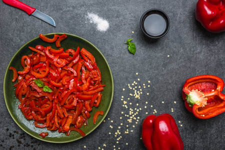 Grilled vegetables. Plate with grilled paprika stripes on dark background. Healthy food concept.の写真素材