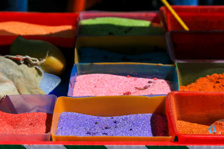 Colored crystal sugar powder sold on the streets in Mexico