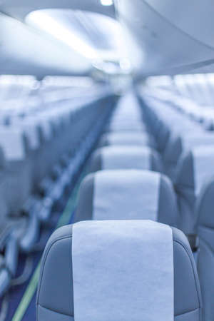 perspective view of empty aircraft seats and lights