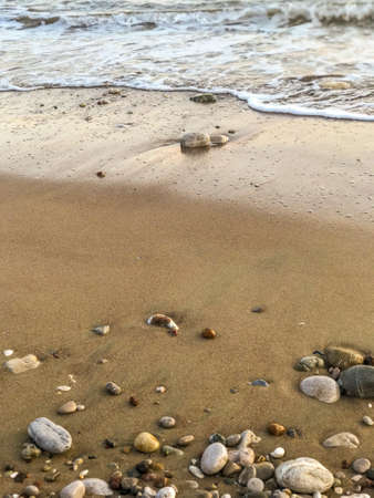 Waves and pebbles
