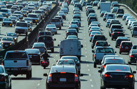 Crowded vehicle traffic and the only motorcycle in America