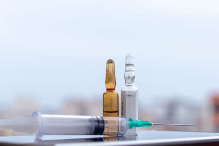 Drug ampoules and syringe used for vaccineの写真素材