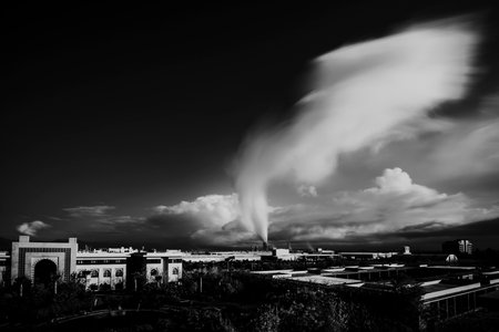 Factory with smoke rising into the sky in Turkeyの写真素材