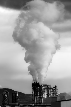 Factory with smoke rising into the sky in Turkeyの写真素材