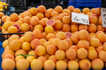 A stall selling grapefruit at the Antalya public marketの写真素材