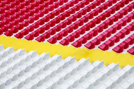 Grandstand with red and white seats. rhythm. row seatsの写真素材