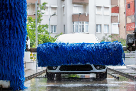 Washing the car in an automatic washing machine. Brushed Car Washing Machineの写真素材