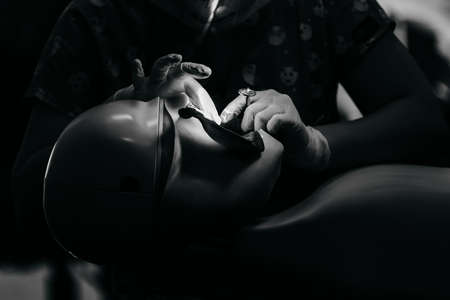 Dental treatment training with model human heads for students of the faculty of dentistry