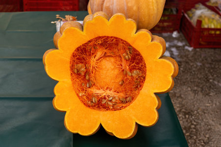 Pumpkin cut in the middle. Orange colored pumpkinの写真素材