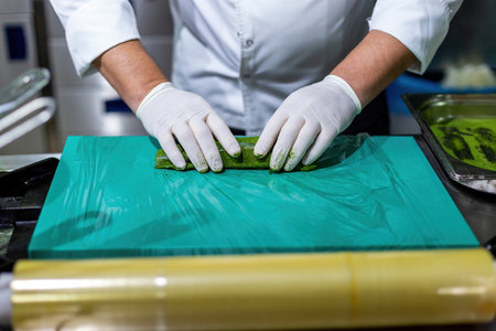 The chef cooking sole. Marinating fish with a mixture of 5 spices. green spicesの写真素材