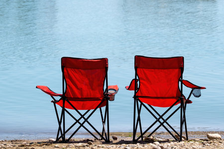 2 empty outdoor chairs on the sea beach. Picnic Chair in Turkeyの写真素材