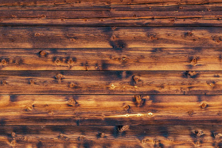 A wall pattern made of old wooden boards. old wood texture.の写真素材