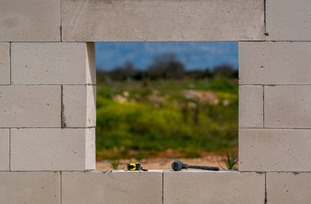 construction of a new house from a bituminous concrete blockの写真素材