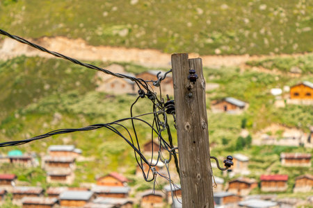 Electricity poles and cables used in mountain villages in Turkeyの写真素材