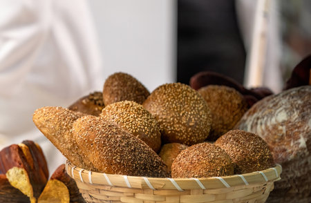 Various breads in a bread basket. Whole wheat breadの写真素材