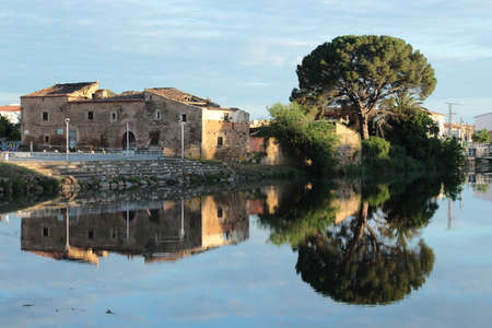 Reflections of a factory in the river. Moraleja, C?ceresの写真素材