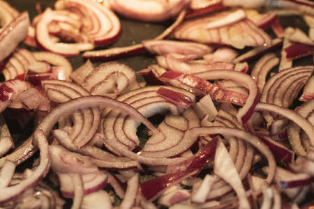 Cooking grilled red onion slices.の写真素材