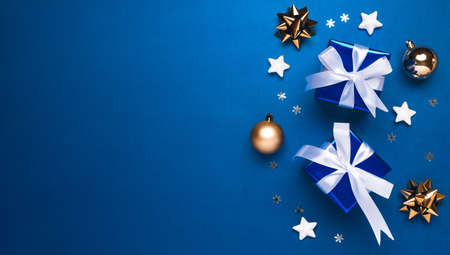 Merry Christmas and Happy Holidays greeting card background with copyspace on the left. Christmas...