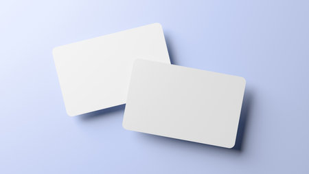 Rounded corners business cards mock up for design template. Blank credit card mockup front and back on a blue background in realistic 3D renderingの写真素材