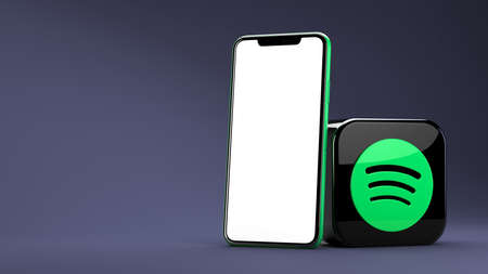 Valencia, Spain - April, 2021: Spotify app icon and phone with copy space for social media in 3D rendering. Spotify is one of the most popular music streaming services for mobile and desktop devicesのeditorial素材