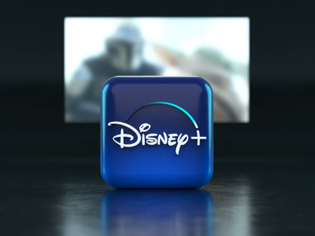 Valencia, Spain - March, 2023: Disney plus app  in front of a TV screen, icon in 3D illustration. Disney plus is a global provider of streaming movies and TV seriesのeditorial素材