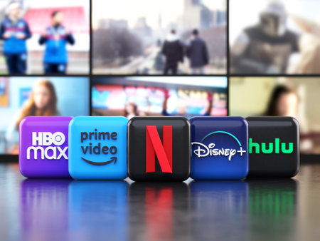 Valencia, Spain - March, 2023: App of the main providers of streaming movies and TV series in front of TV screens, icons in 3D illustration. Netflix, Prime Video, Disney Plus, Hulu and HBO Maxのeditorial素材