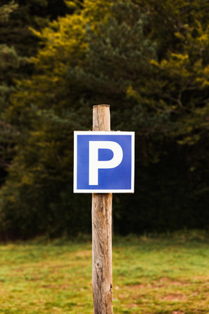 Square parking sign in a natural and forest environmentの写真素材