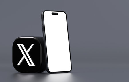 Valencia, Spain - July, 2023: X app icon with mobile phone mockup isolated on a dark background in 3D render. X is the new name and of the social network Twitter owned by Elon Muskのeditorial素材