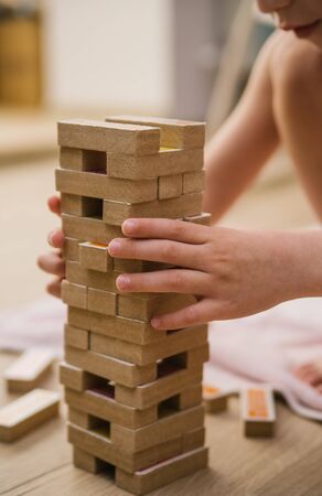Tower Board game. Home entertainment. Wooden elements of the game. Sit at home.の写真素材