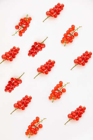 Red currant on a white background.Bright summer berries. The summer harvest. Natural vitamin.