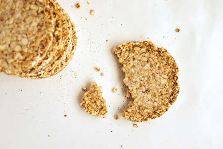 Crunchy and airy loaves on a white background, diet crunchy round rice waffles. Good nutrition.