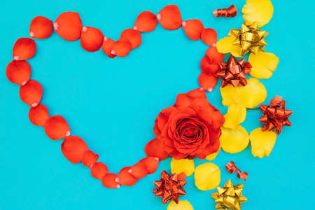 Rose flowers and petals close-up and gift bows. Valentine's day. Flower arrangement. Background of Valentine's day and March 8.の写真素材