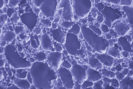 The color of 2022. Abstract background painted in a fashionable color.Close-up of the pores of a...