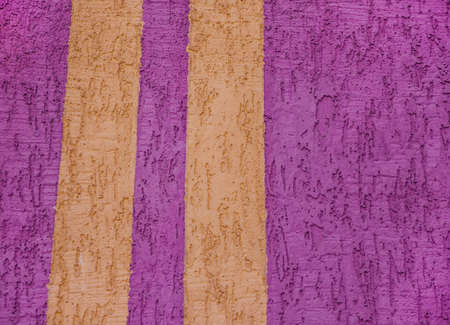 Background surface with the texture of pink plaster. vertical yellow lines. Old cement horizontal...