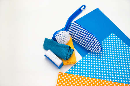 Several different cleaning brushes on a white background. Convenient equipment for cleaning the...